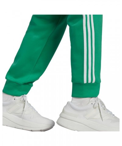 Women's Future Icon Three Stripes Regular Pants Semi Court Green $25.22 Pants